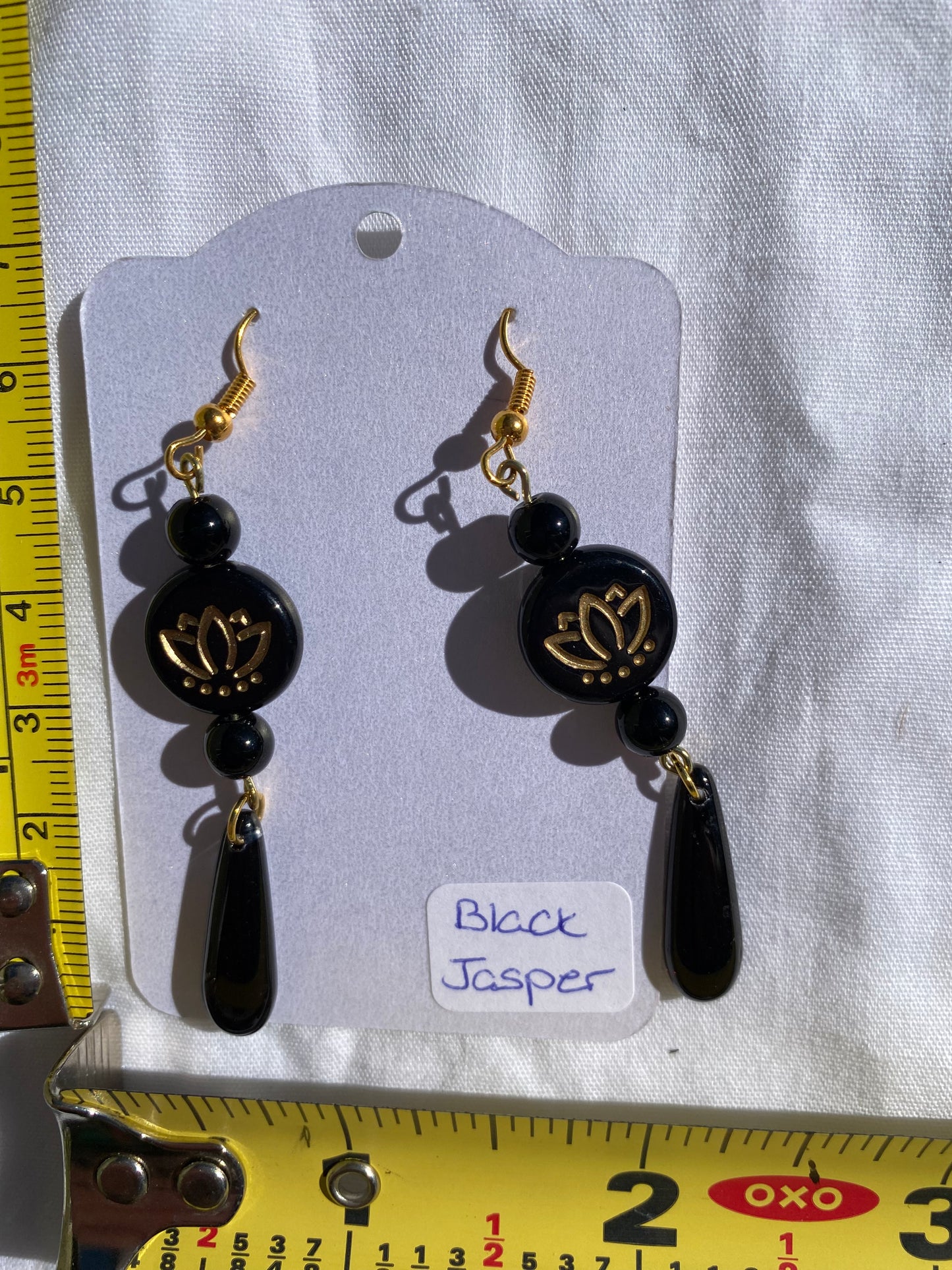 Black Jasper Handmade Drop Earrings with a Floral Accent