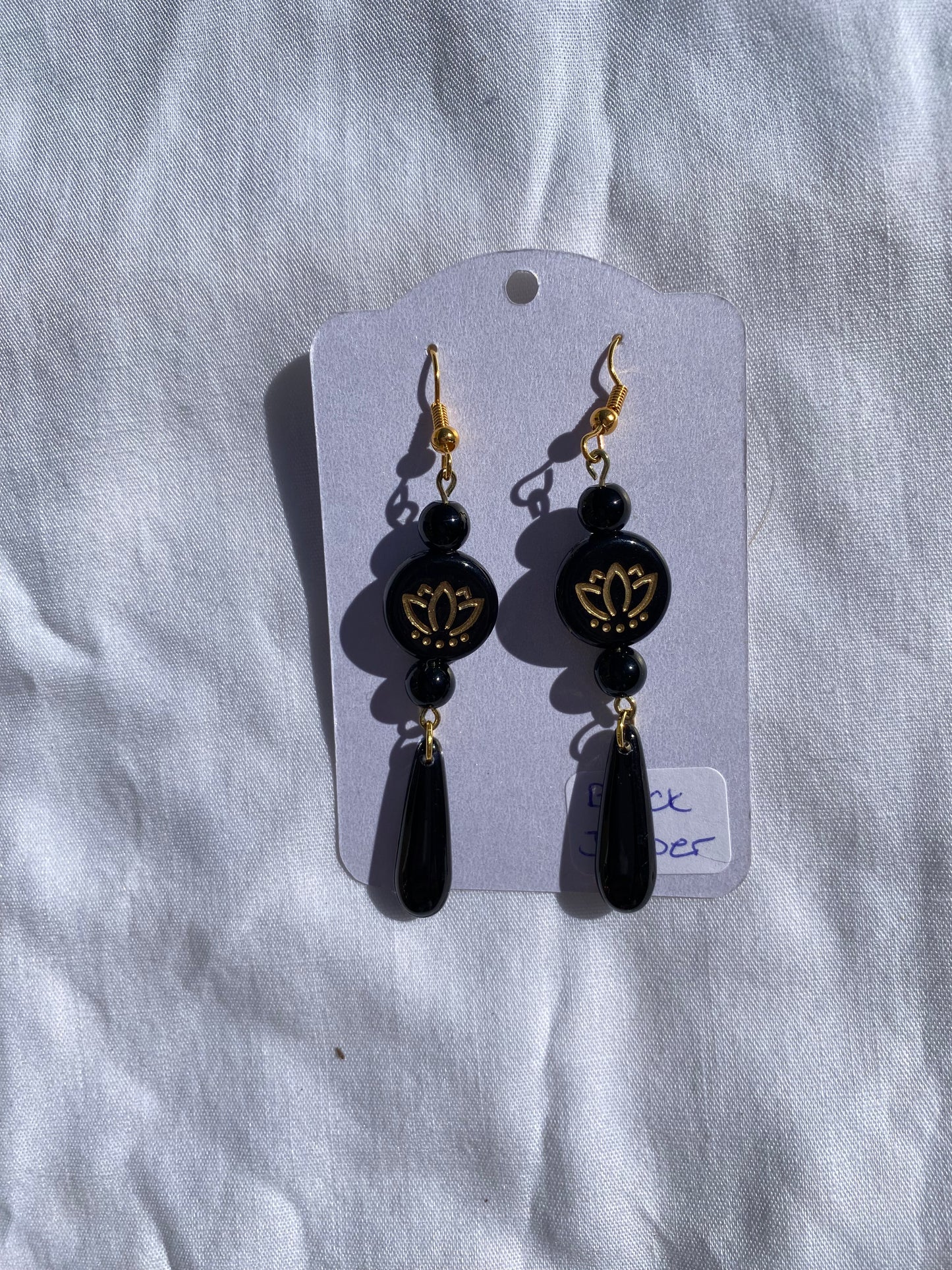Black Jasper Handmade Drop Earrings with a Floral Accent