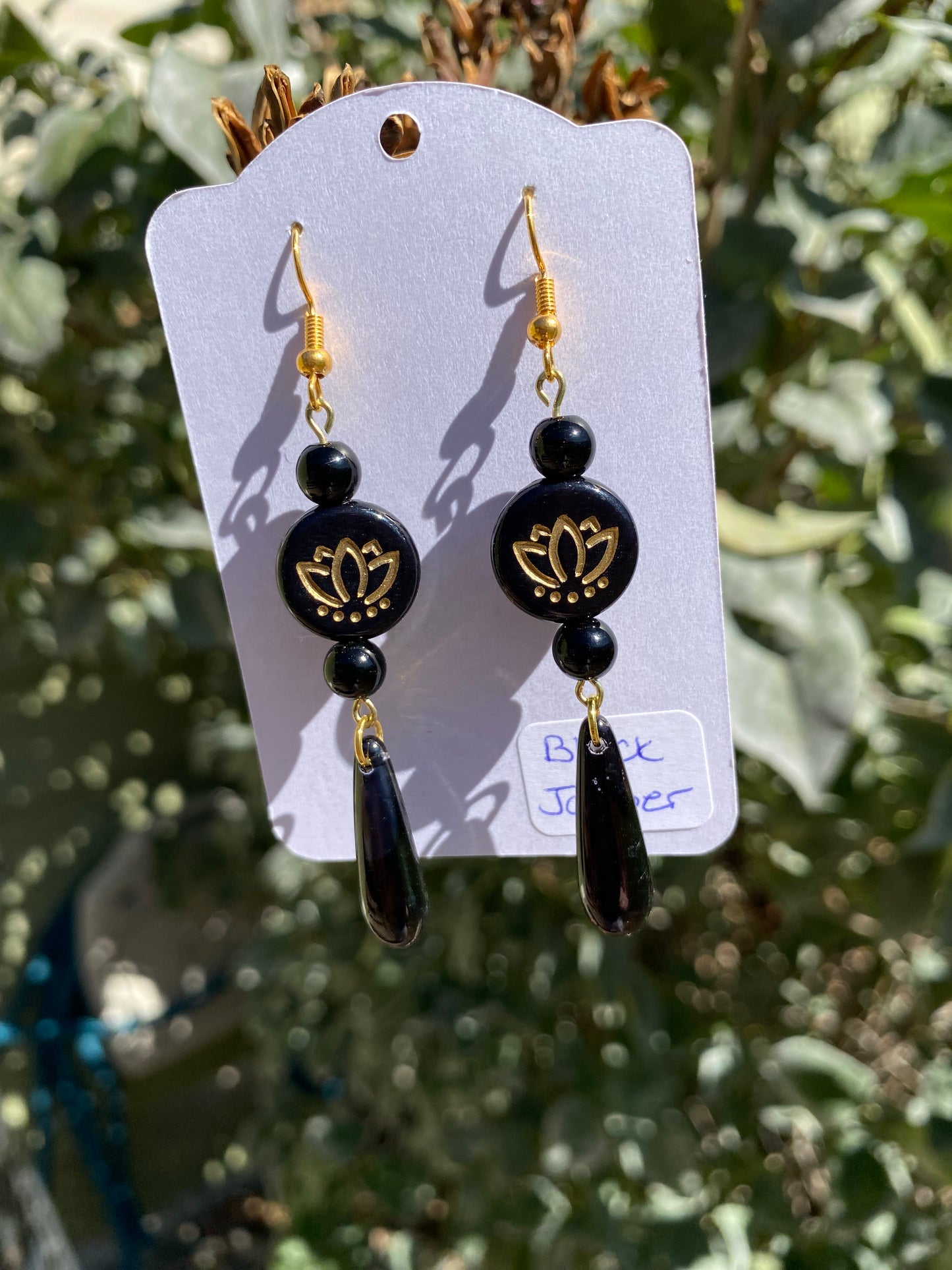 Black Jasper Handmade Drop Earrings with a Floral Accent
